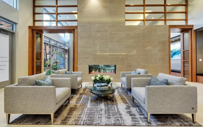 a living room with a large glass wall