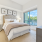 Bedroom with large windows