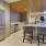 a kitchen with a table and chairs