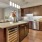 a kitchen with a marble island