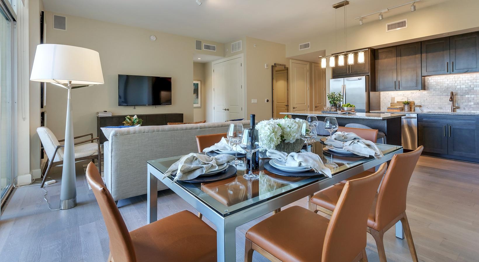 Relax and unwind in stylish living spaces a kitchen with a dining table
