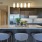 a kitchen with a marble island