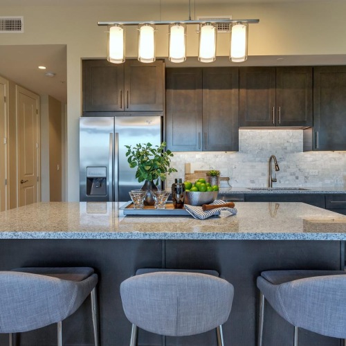 Beautiful kitchens with designer finishes a kitchen with a marble island