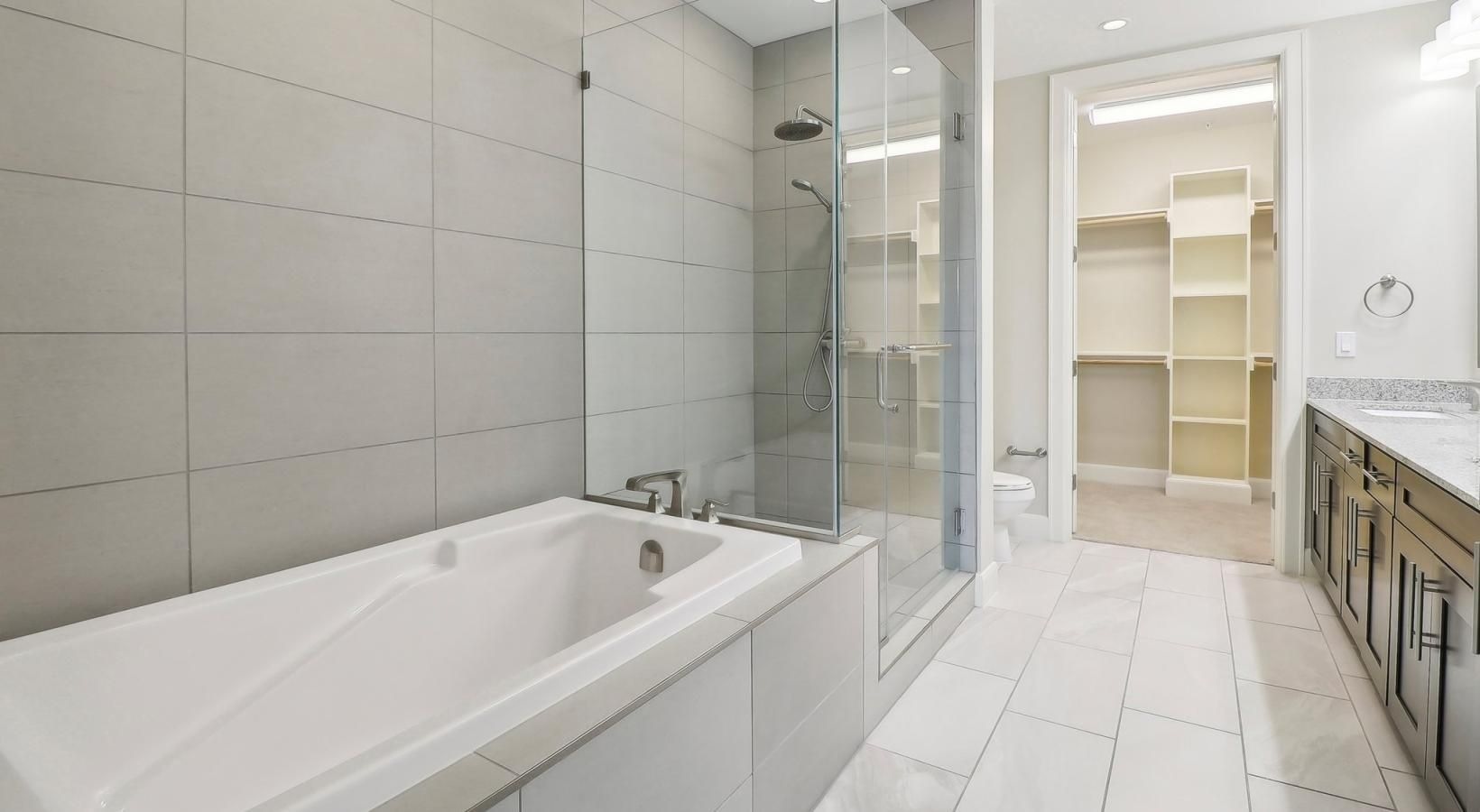 Spacious bathrooms with everything you need a bathroom with a glass shower